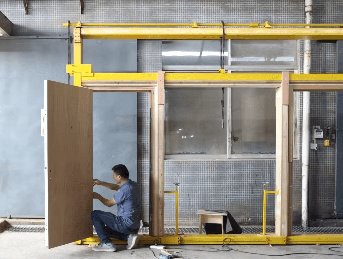 Pre-assemble firedoor in the factory